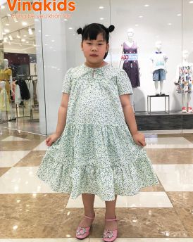 Váy bé gái vải thô hoa nhí màu xanh cỡ 30kg -50kg